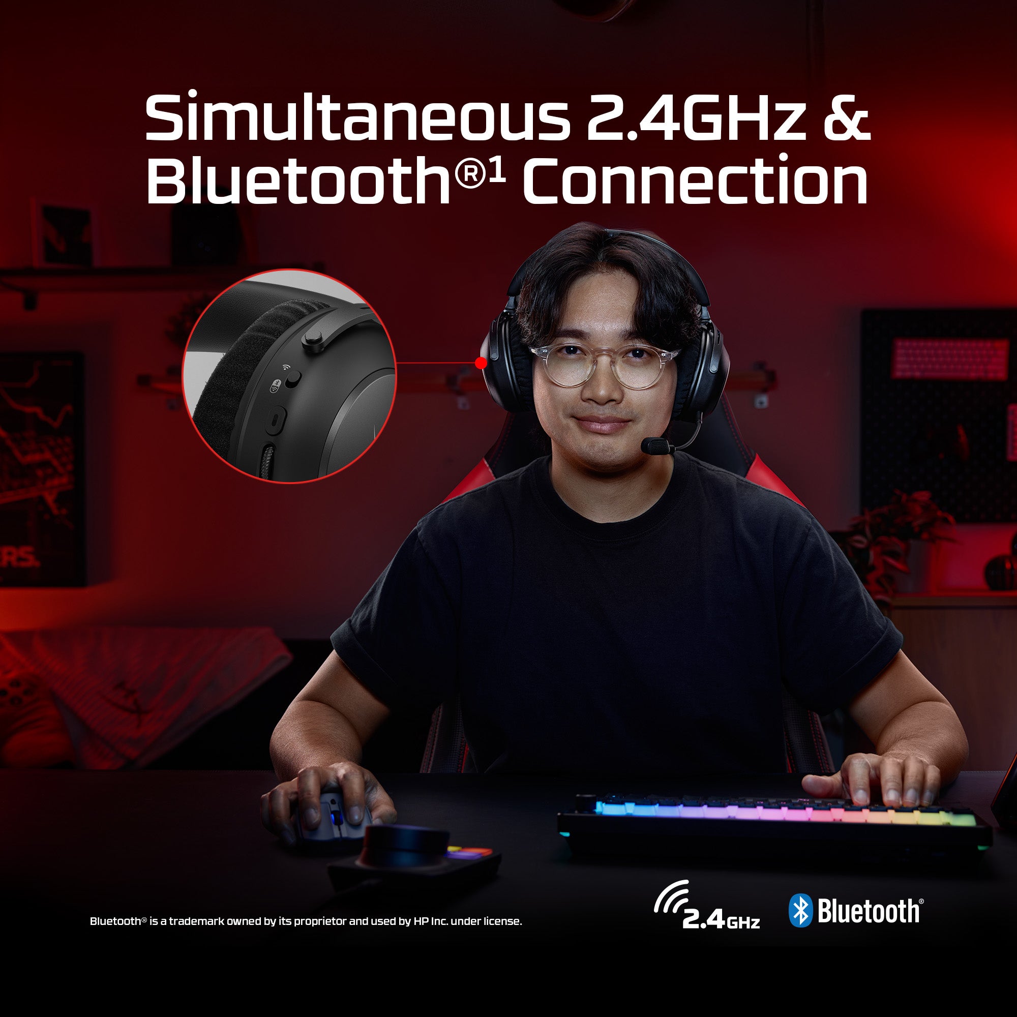 Person wearing headphones using a computer setup with text about simultaneous 2.4GHz and Bluetooth connection.