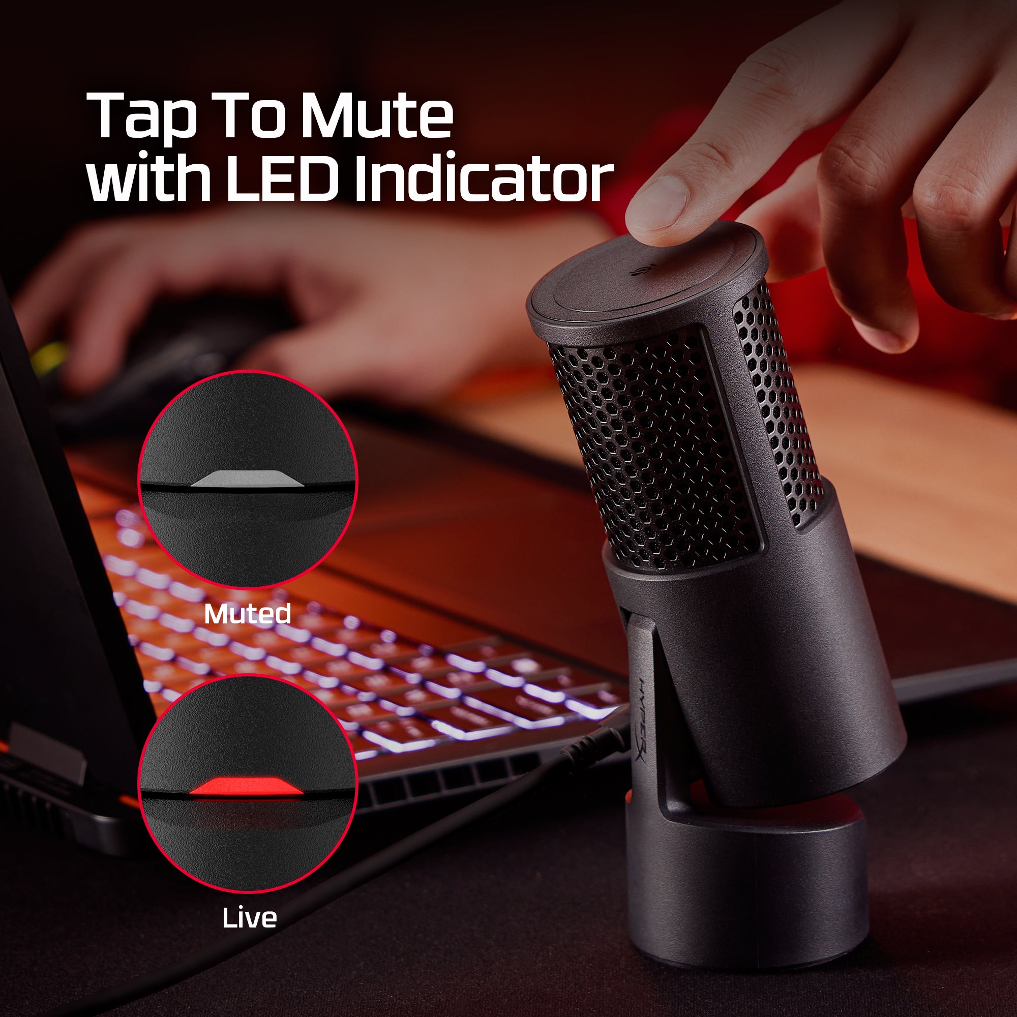 Black microphone with mute feature and LED indicator in front of a laptop.